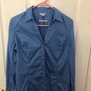 Women’s button down v-neck shirt. 2% spandex.